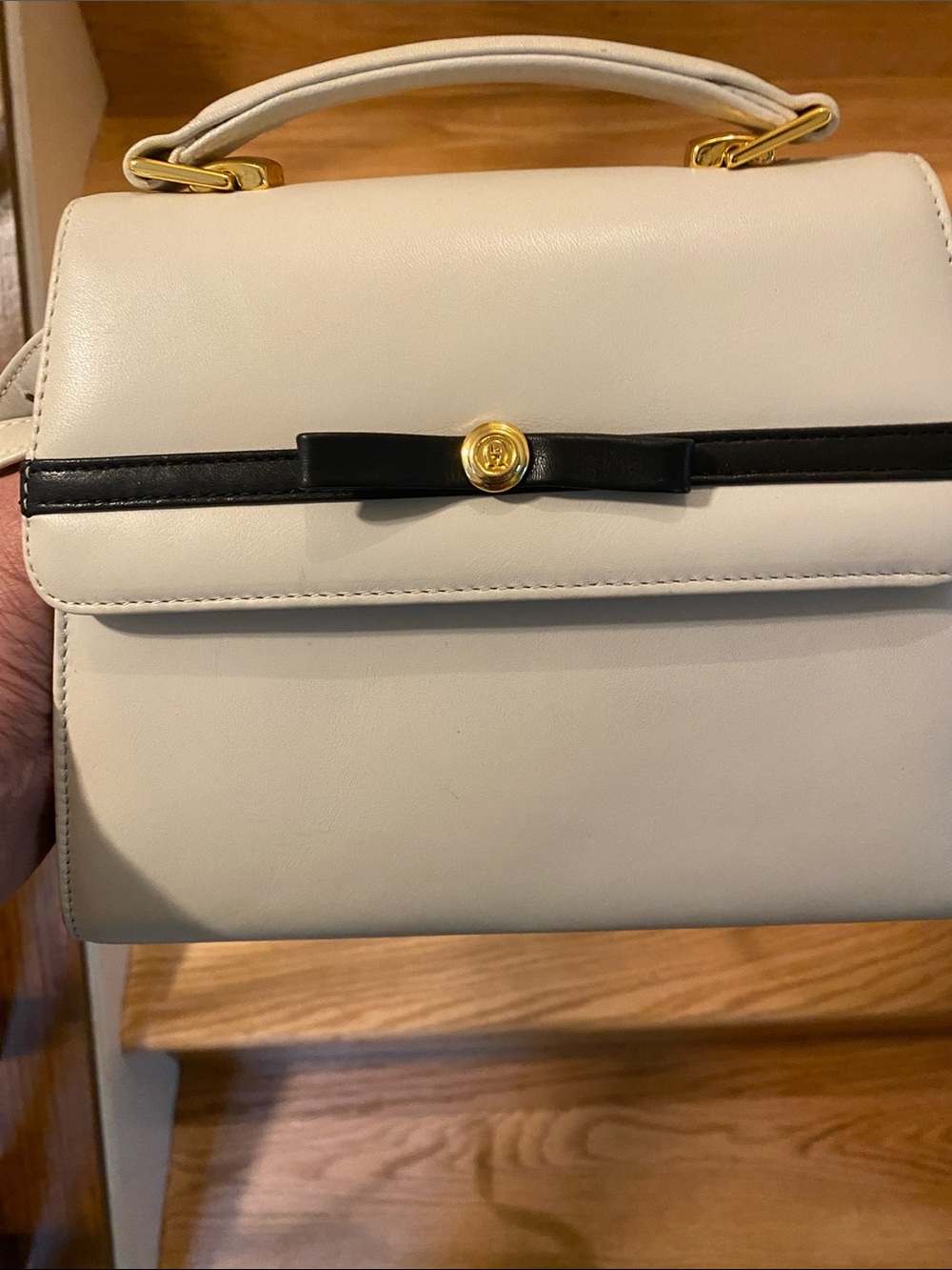 Etienne Aigner Cream Satchel with Navy Trim and Gold Hardware. coin pocket.